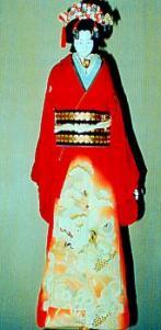 赤い着物を着て日本髪を結っている浄瑠璃人形の写真